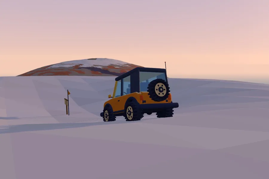 The crawler from behind, spare tyre on the tailgate, on the snowy summit of Mauna Kea at golden hour.